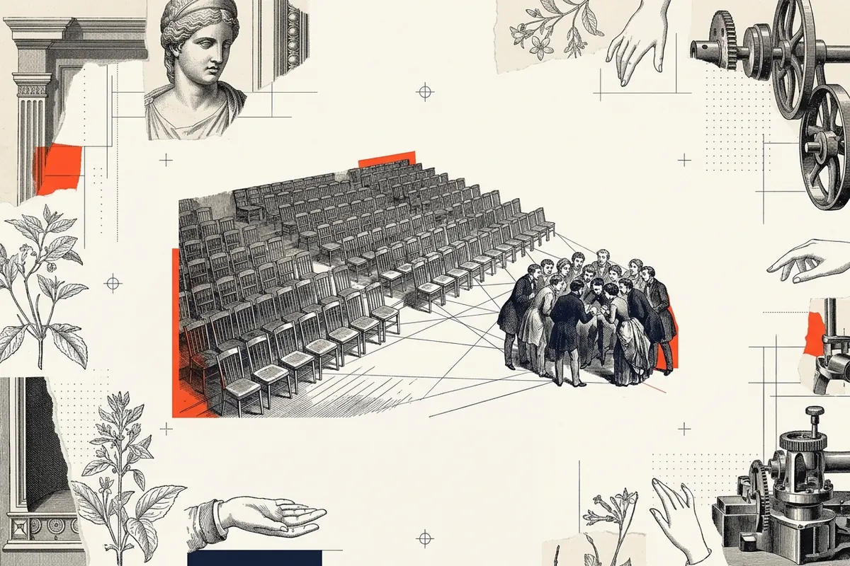 A small group of people huddled together in lively conversation in one corner of a large 19th-century lecture hall full of empty rows of chairs