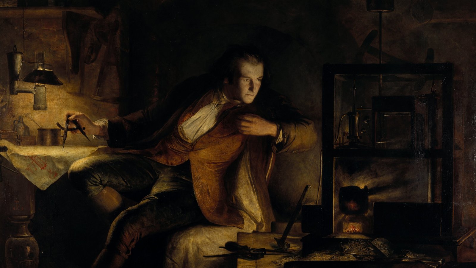 James Watt sitting in his workshop by lamplight, with a model of a steam engine beside him