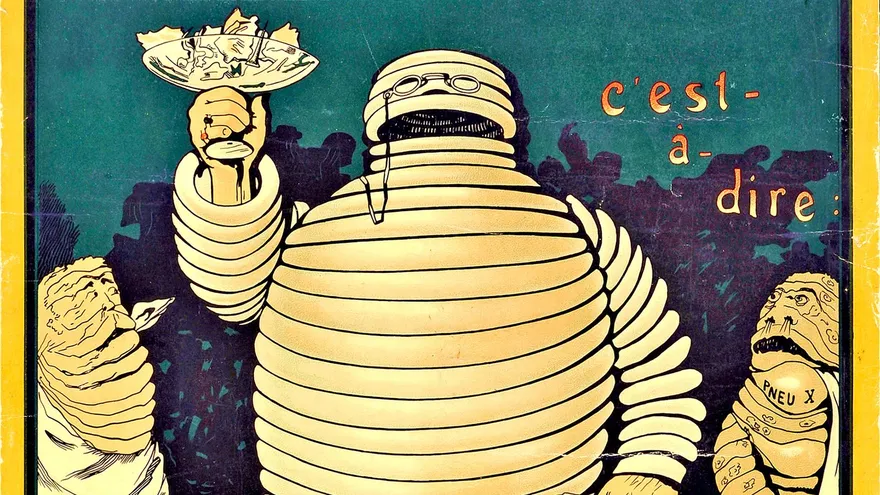 O'Galop'un 1898 tarihli Michelin afişinde lastiklerden oluşan Bibendum, elinde çivi ve cam kırıklarıyla dolu kadehi kaldırıyor